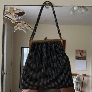 Vintage Whiting and Davis black chain purse.